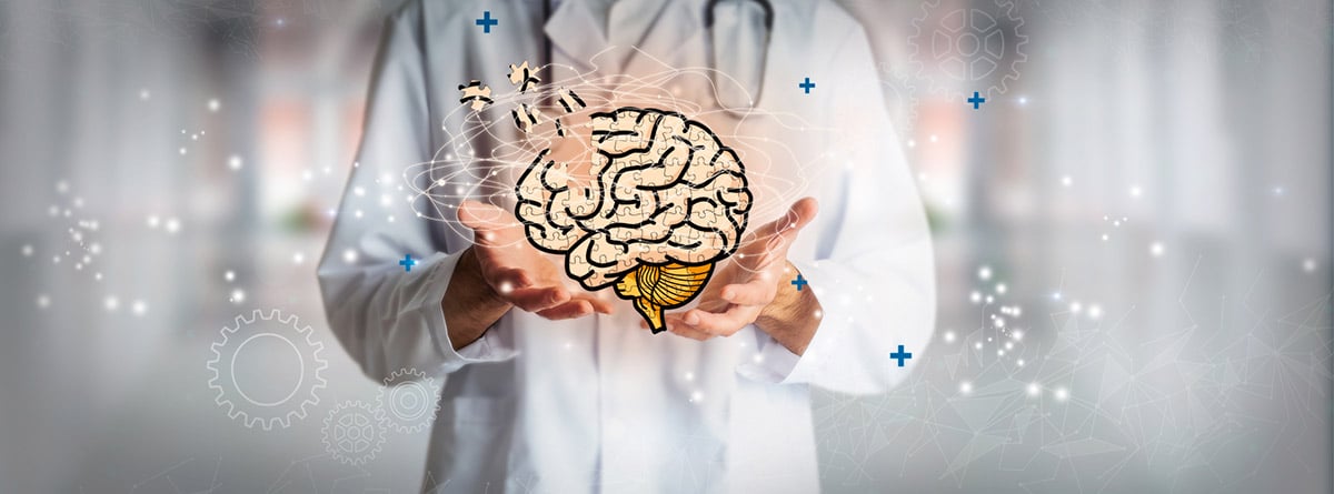 ¿Qué es la sobrecompensación en psicología?: Médico de neurología sosteniendo un cerebro en concepto de salud mental.