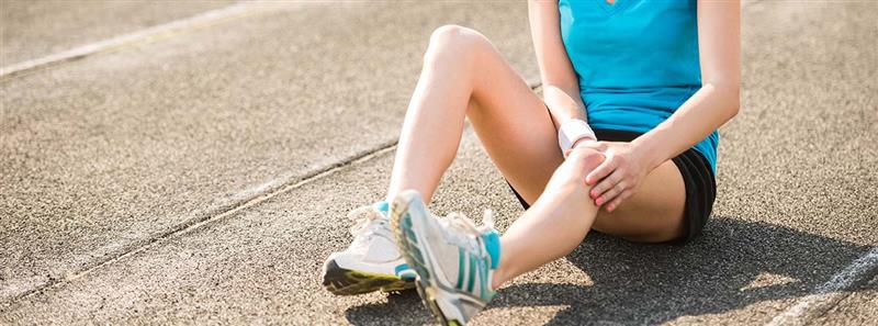 Corredor con dolor de piernas