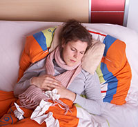 enferma de gripe